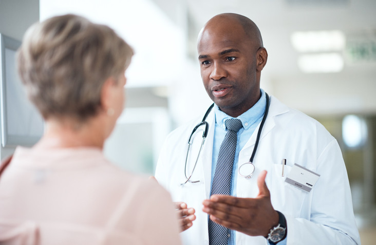 Doctor consulting patient